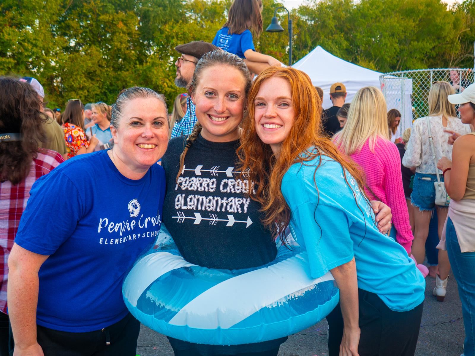 three teachers smiling